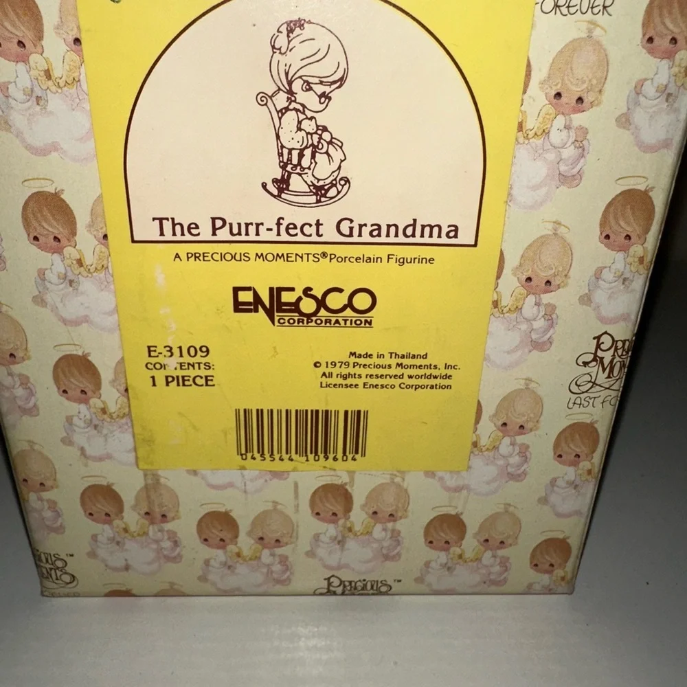 Precious‎ Moments Gray and Cream Figurine